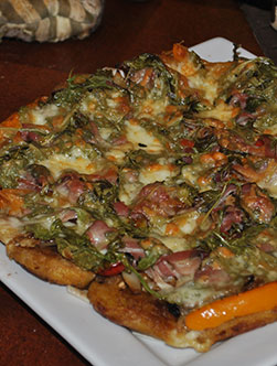 Pizza sur lit de plantains